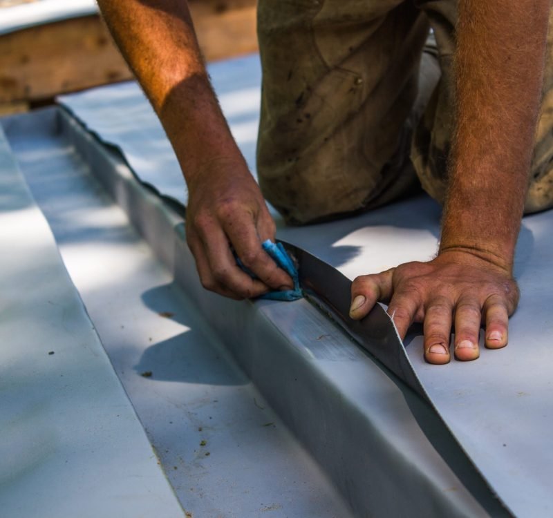 Cleaning,Seams,With,Rag,And,Seam,Cleaner